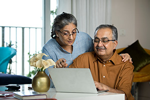 couple looking at computer